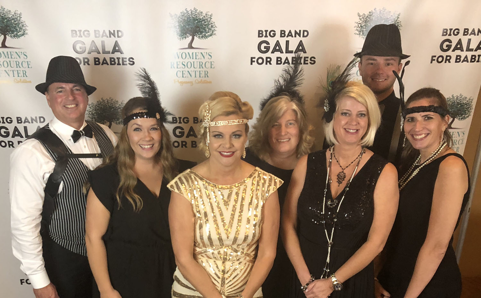 Team HL Raymond Properties group photo during big band gala for babies